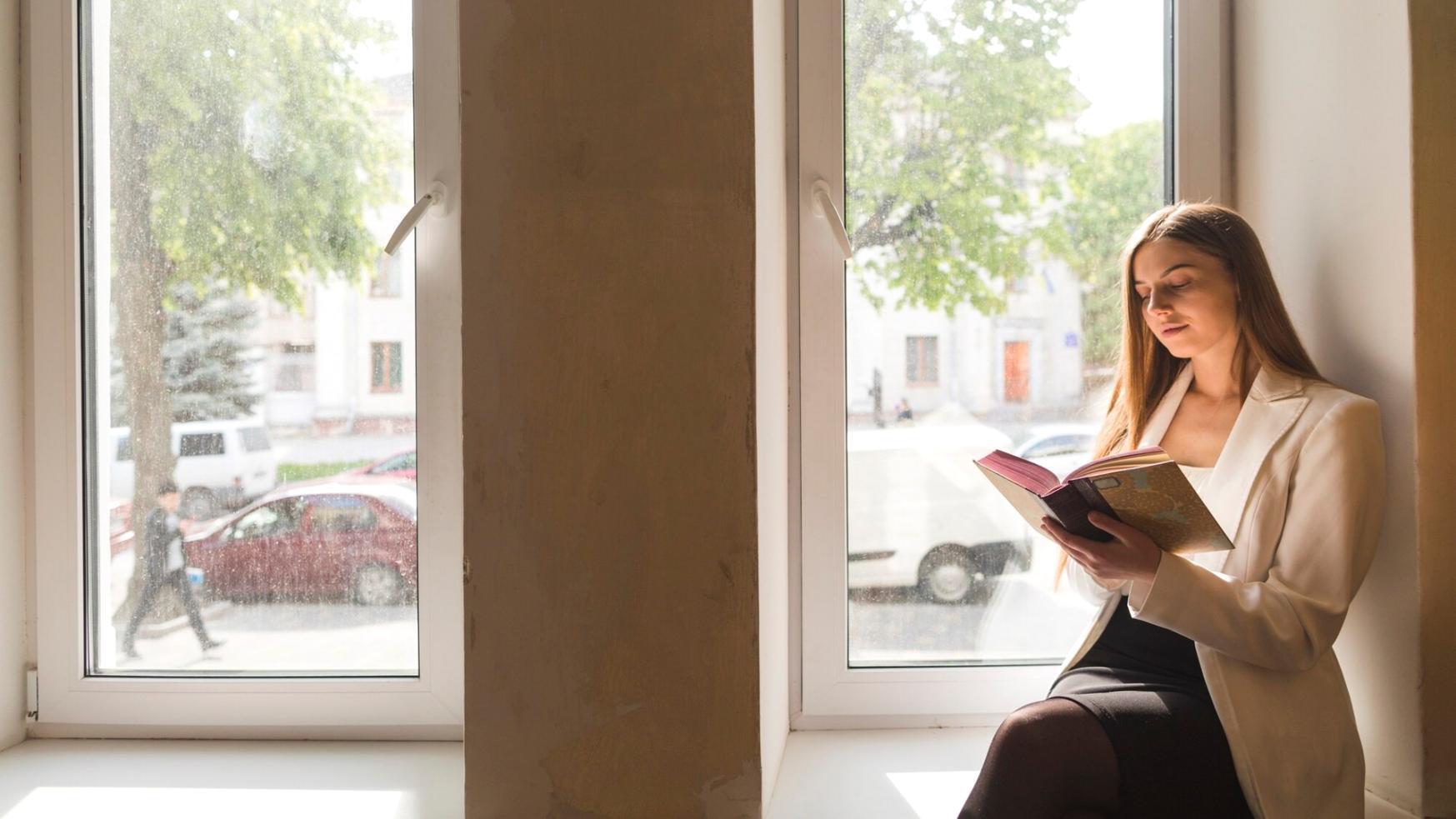 Study materials and investment documentation spread across table